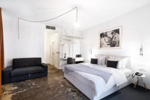 Postel nebo postele na pokoji v ubytování Art Hotel Tartini