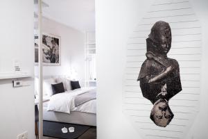 Postel nebo postele na pokoji v ubytování Art Hotel Tartini