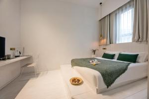 Letto o letti in una camera di Suzhou Unique Space Design Art Hotel