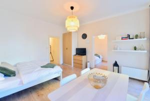 Łóżko lub łóżka w pokoju w obiekcie Perfect for Families and Mid-Term-Stays