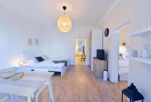 Łóżko lub łóżka w pokoju w obiekcie Perfect for Families and Mid-Term-Stays