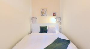 Łóżko lub łóżka w pokoju w obiekcie Perfect for Families and Mid-Term-Stays