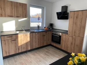 Küche/Küchenzeile in der Unterkunft Ferienwohnung Am Südhang
