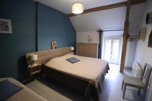 Postel nebo postele na pokoji v ubytování Gîte le Pilon
