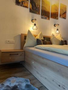 Postel nebo postele na pokoji v ubytování NeuhausLiving