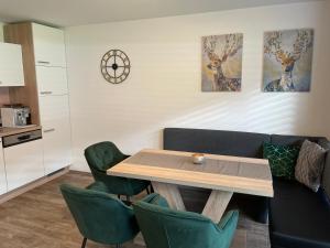 Kuchyň nebo kuchyňský kout v ubytování NeuhausLiving + 21 fotografií