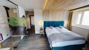 Posteľ alebo postele v izbe v ubytovaní Hotel Panther'A