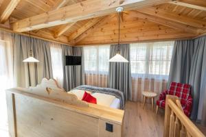 Voodi või voodid majutusasutuse Dorf-Chalets Filzmoos mit Sauna toas