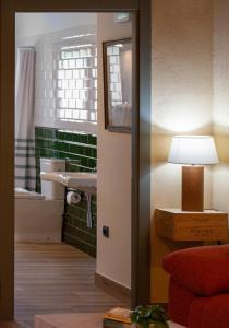 Ein Sitzbereich in der Unterkunft Priorat Aparthotel