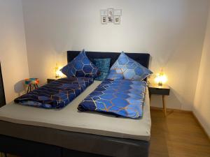 Posteľ alebo postele v izbe v ubytovaní Hotel Schwarzer Adler