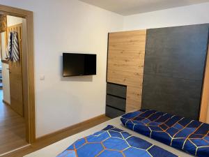 Posteľ alebo postele v izbe v ubytovaní Hotel Schwarzer Adler