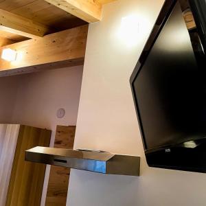 A television and/or entertainment centre at EMMA's Studio