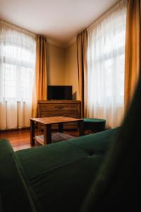 Televízia a/alebo spoločenská miestnosť v ubytovaní Willa 654