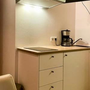 A kitchen or kitchenette at EMMA's Studio