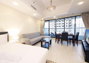 RH- Cozy Studio, Al Waleed , Cluster R, JLT客房内的一张或多张床位