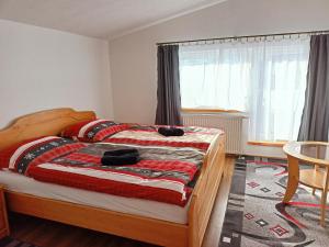 Postel nebo postele na pokoji v ubytování Apartmán Vladimír - Liptov