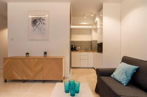 Kuchyňa alebo kuchynka v ubytovaní Apartament Źródlana Ski 300M + 9 fotografií