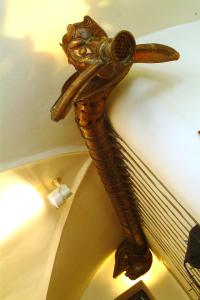 a statue of a seahorse hanging from a ceiling at Besidka in Slavonice