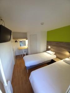 Postel nebo postele na pokoji v ubytování Fasthôtel Limoges Nord - FH Confort
