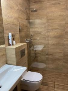 Ванна кімната в Apartament Comfort Kahlberg