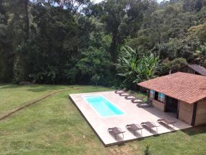 La alberca dentro o cerca de Pousada Pizzaria do Vale