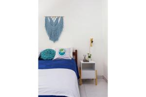 Postel nebo postele na pokoji v ubytování Arpoador Apts Praia & Piscina - Buzios Rentals