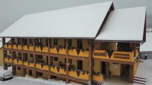 Apartamente Manó Apartmanok durante o inverno