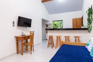 TV a/nebo společenská místnost v ubytování Arpoador Apts Praia & Piscina - Buzios Rentals