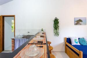 Kuchyň nebo kuchyňský kout v ubytování Arpoador Apts Praia & Piscina - Buzios Rentals