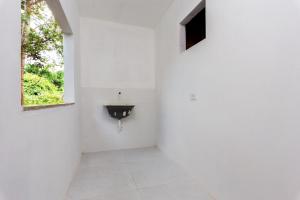 TV a/nebo společenská místnost v ubytování Arpoador Apts Praia & Piscina - Buzios Rentals