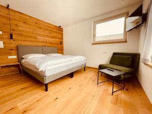 Llit o llits en una habitació de AUSZEIT Appartement