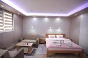 Katil atau katil-katil dalam bilik di Apartmani Božović