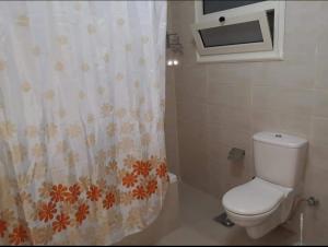 Ванная комната в Jessy Charming apartment in Heliopolis