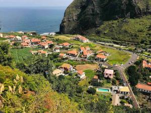 a small village on a hill near the ocean at Terra Chã Cottage,FEEL Home, in São Vicente