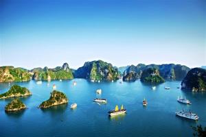 a group of islands in the water with boats at Halo Bay Homestay in Ha Long