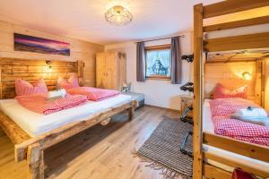 Posteľ alebo postele v izbe v ubytovaní Großes App Chalet Bergprinzessin