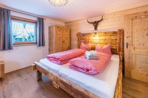 Posteľ alebo postele v izbe v ubytovaní Großes App Chalet Bergprinzessin