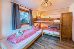 Posteľ alebo postele v izbe v ubytovaní Großes App Chalet Bergprinzessin