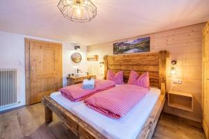 Posteľ alebo postele v izbe v ubytovaní Großes App Chalet Bergprinzessin