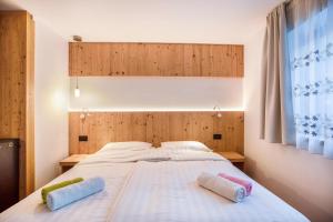 Letto o letti in una camera di Chalet Osmar Suite 1
