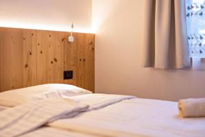 Letto o letti in una camera di Chalet Osmar Suite 1