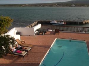 A view of the pool at Luxury Breede River View at Witsand- 300B Self-Catering Apartment or nearby