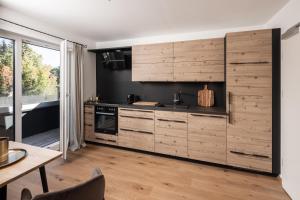 Kuchyňa alebo kuchynka v ubytovaní Moxn Apartment Lungau - Small Penthouse mit Terrasse