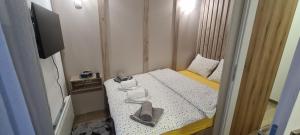 Ліжко або ліжка в номері Apartman Mina Jezero