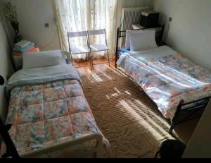 Posteľ alebo postele v izbe v ubytovaní Φανταστικός χώρος δίπλα στον μύλο ξωτικών