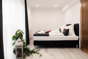 Posteľ alebo postele v izbe v ubytovaní Royal Apartments & Spa Zakopane-Cyrhla