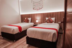 Cama ou camas em um quarto em Casa Matara Boutique