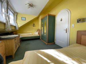Łóżko lub łóżka w pokoju w obiekcie Villa St. Oswald