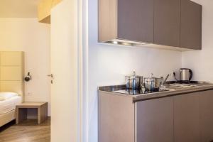 Kuchyňa alebo kuchynka v ubytovaní Apartment Ön Residence Bun Ste