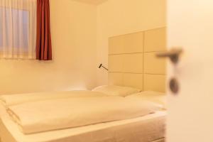 Posteľ alebo postele v izbe v ubytovaní Apartment Ön Residence Bun Ste
